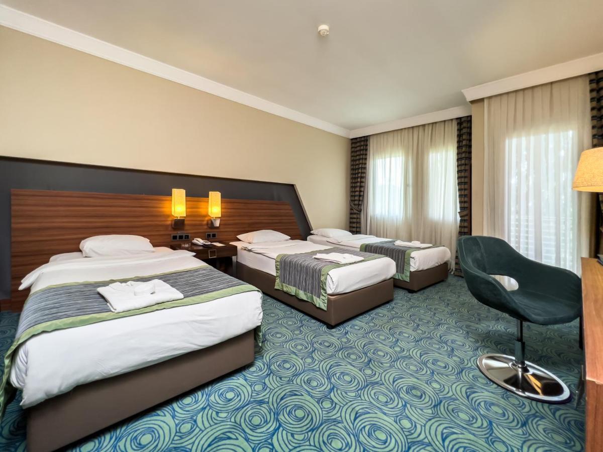 Spa Hotel Colossae Thermal Karahayit  Екстер'єр фото A room at the hotel